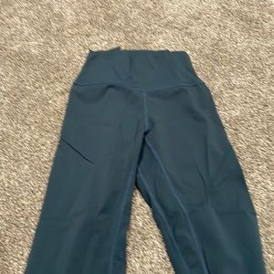 Born primitive. Dark green legging